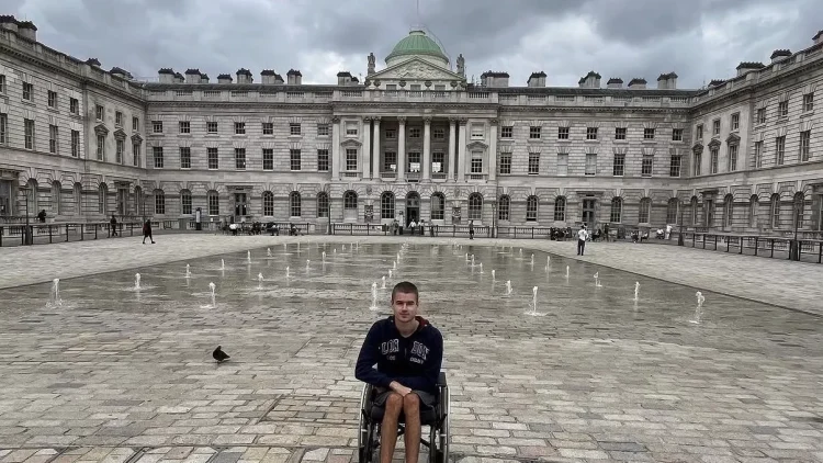 UK Wheelchair Traveler Liam Virgo Shares Journey from FND Diagnosis to Exploring Over 120 Cities
